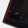 Vue rapprochée du poster Nissan Skyline GTR R34 Midnight Purple Tourismo avec coupé japonais sombre et feux arrière rouges