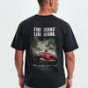 T-shirt noir Spa Grand Prix, gros plan sur le design Eau Rouge avec monoplace rouge sur le circuit